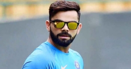 ভক্তকে দেশ ছাড়তে বলে বিপাকে কোহলি
